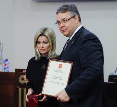 За вклад в подготовку и проведение Олимпиады